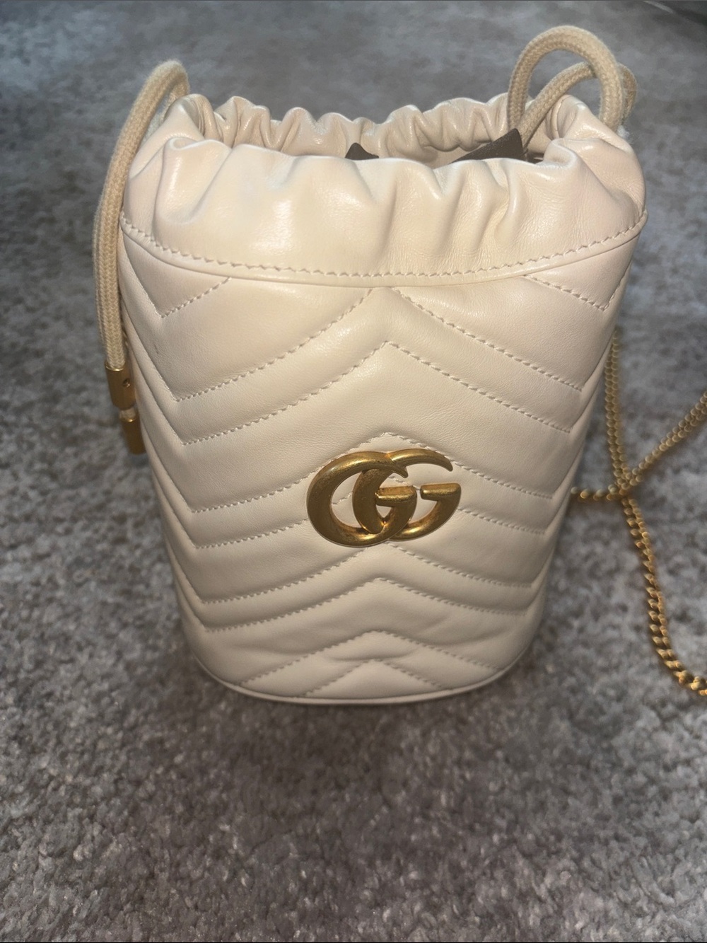 Gucci Cream Matelassé Mini Drawstring Bucket Bag with Gold GG